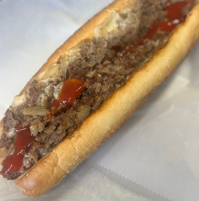 Philly Cheese Con Papas.