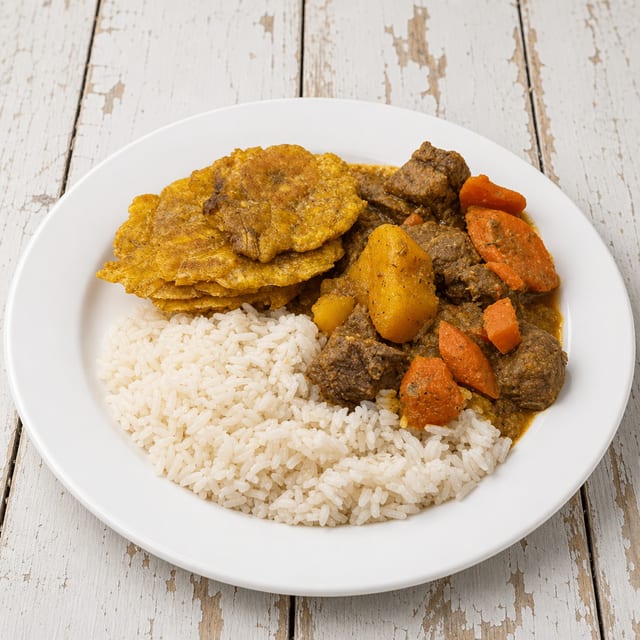 Carne Guisada Arroz B H Tostones.