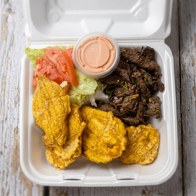 Churrasco y Tostones.