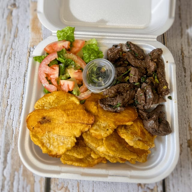 Churrasco A/gand Tostones / Skirt Steak Yellow Rice.